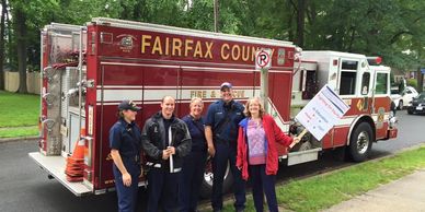 Karen with a few of our brave Firefighters on the 4th of July