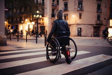 Wheelchair Power Assist Device added to manual wheelchair will optimize mobility to many users