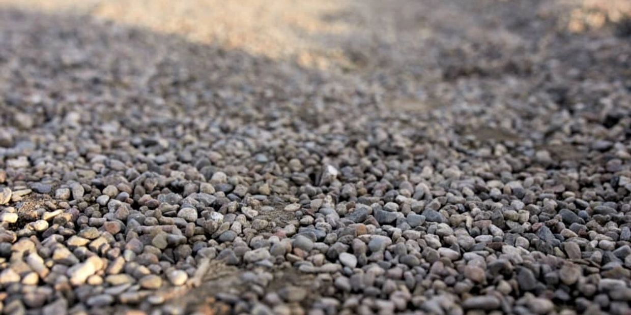 Close-up of a gravel path in sunlight.