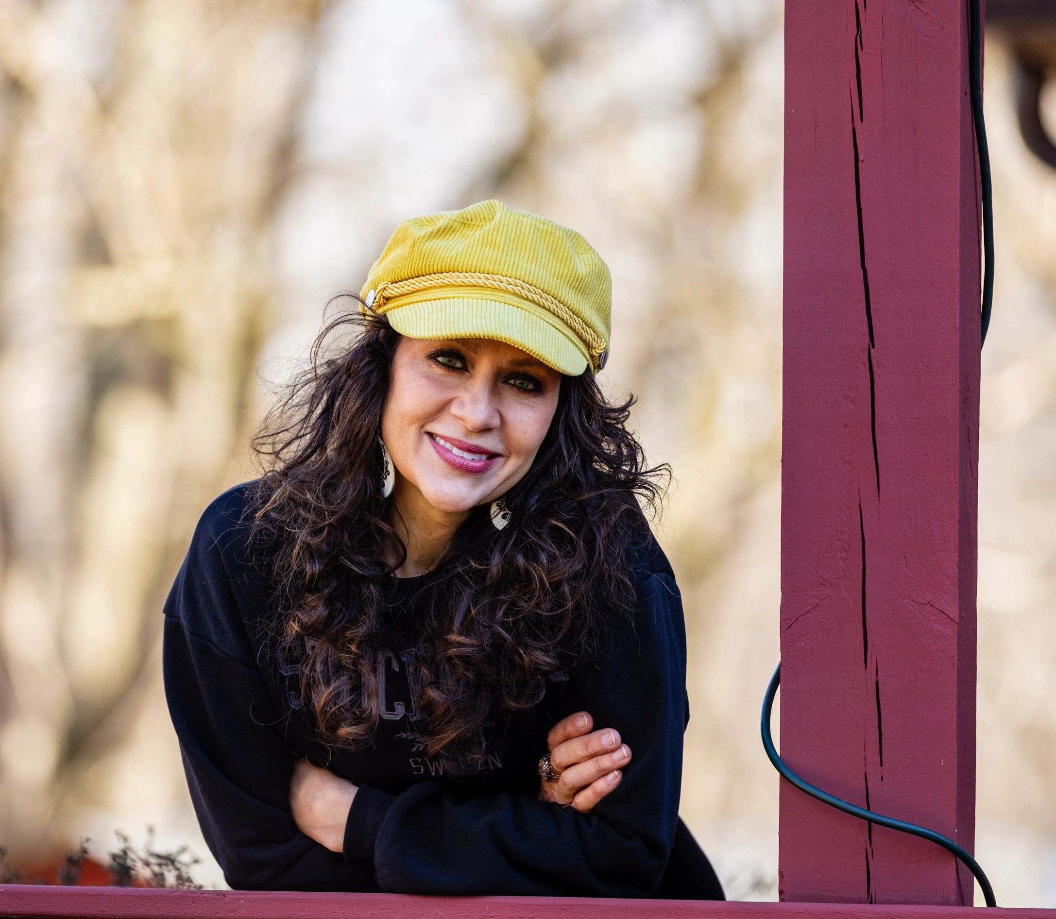 a woman wearing a yellow hat