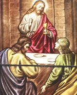Jesus giving communion to the disciples