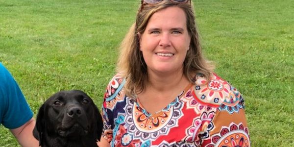 dog trainers with dog ribbon