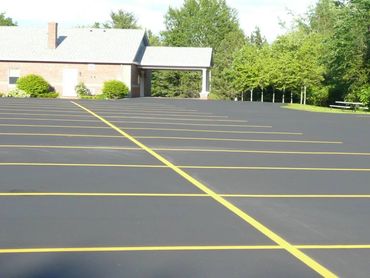  Before and After
Seal Coating & Line-Striping
