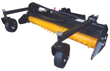 A black and yellow tow-behind rotary mower with two wheels.