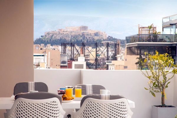 Dine with direct view of Acropolis.