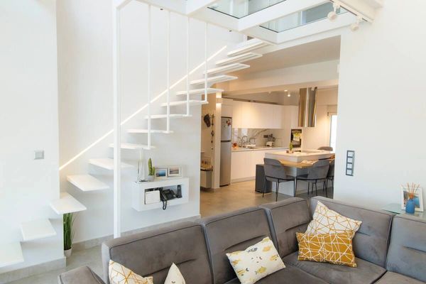 Ultra modern floating stairs and a glass floor!