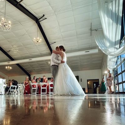 Bride & Groom dancing their first dance at Pointe D'Vine in Quincy, IL.
