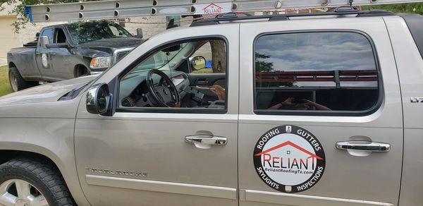 Reliant roofing work trucks