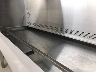 Clean drain pan of Biological Safety Cabinet (BSC) after CCI cleaning