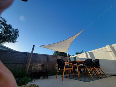 4x4 post cemented into the ground and a sunshade installed.