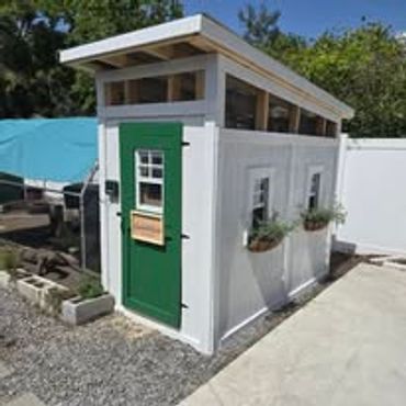 8'x4' coop with working windows, a man door and a chicken door.