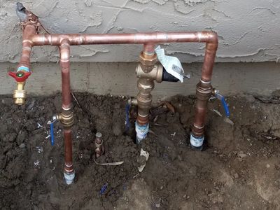 New copper lines on water main with new valves and pressure reducing valve in Morgan Hill.