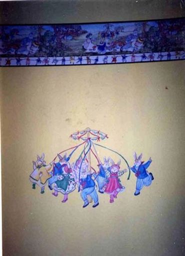Bunnies play in this mural, patterned on the wallpaper art.
