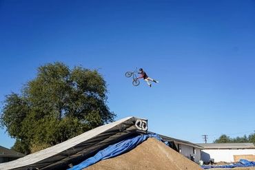 bmx bike rider superman seat grab trick