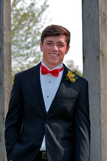Graduation
Boy
Bow tie
Male
Outside
High school
Spring
Summer
Tuxedo