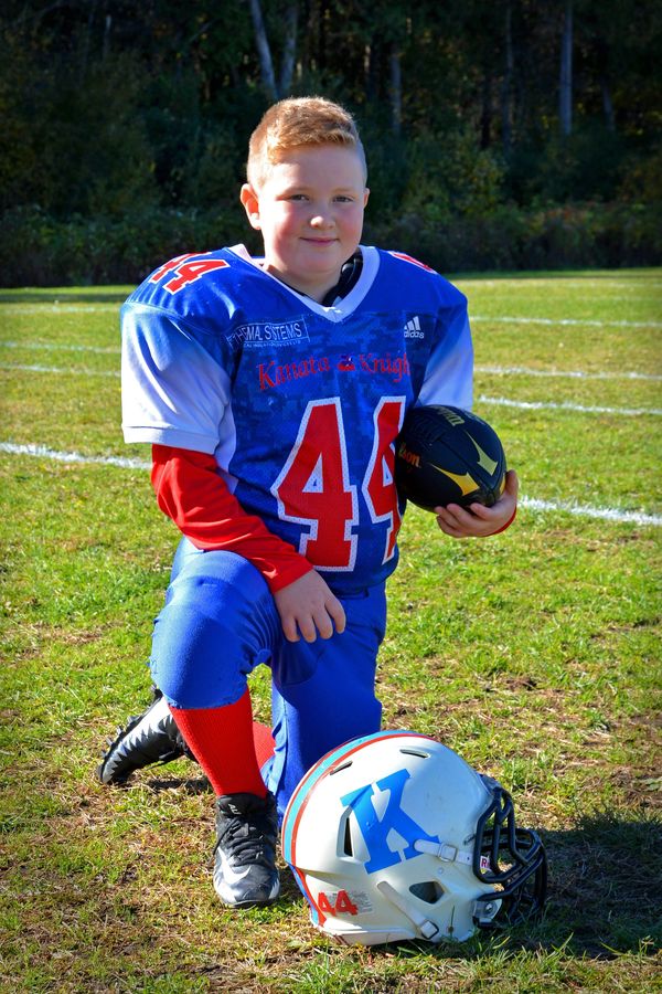 Football
Son
Boy
Helmet
44
Uniform
Outside
Summer
Blonde
Boy