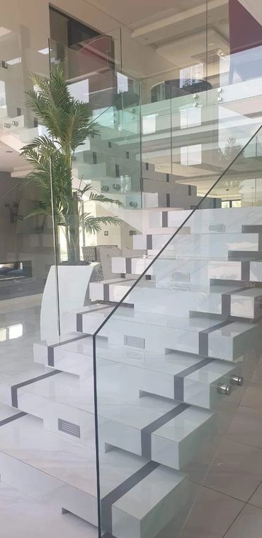 Cutting Edge Tiles The Islands Estate Tile cutting re-sizing Edge profiling 45 degree mitre staircas