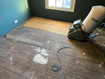 Old Pitch Pine Floorboards being machine sanded with a Lagler Hummel Machine
