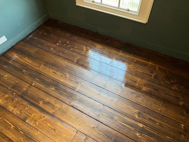 Old Pitch Pine Floorboards coloured with Bona Craft OIl being finished with Bona Traffic HD 2K Water