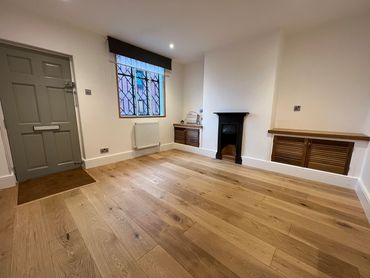 Engineered Oak Plank floor in a terraced house lounge in Loughborough, Leicestershire