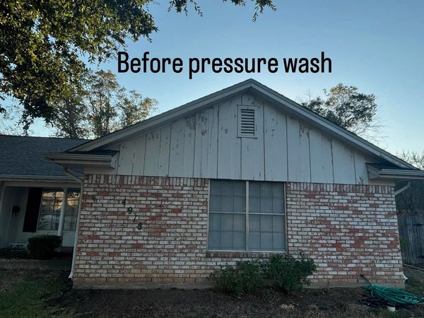 Before pressure washing exterior painting on a brick home in Waco, TX.