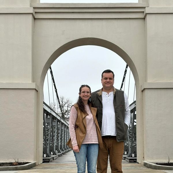 John and Elizabeth Ricker, owners of BrightNest Painting, smiling.