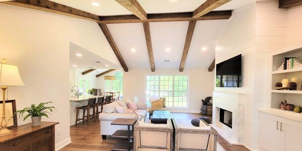 Full home custom remodel living room photo of the finished design in Opelika Alabama. Custom home building and kitchen remodeling