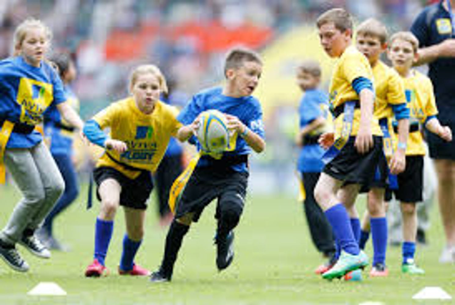 All kids love playing touch rugby.