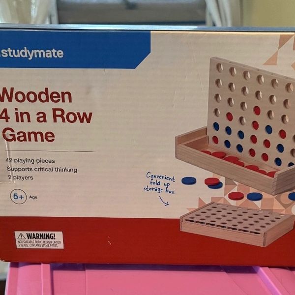 Wooden 4 in a Row game with 42 pieces and fold-up storage box.