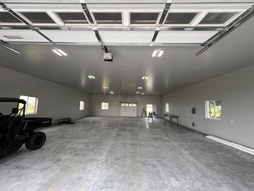 New garage electricity, door, and lighting installation.