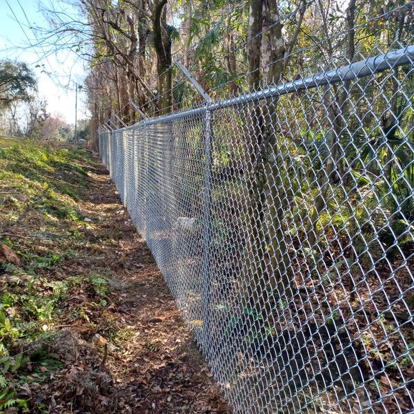 Galvanized 6' commercial grade chain link fence.