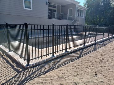 Black 3-channel Emily aluminum fence.