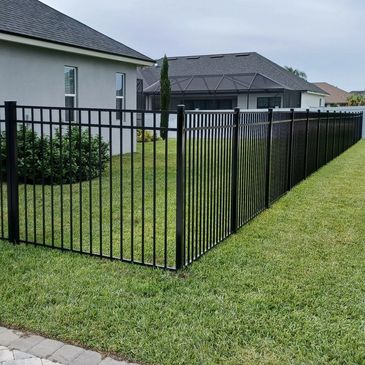 Black 3-channel Emily aluminum fence.