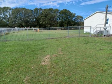 Galvanized 5' chain link fence and double gate.