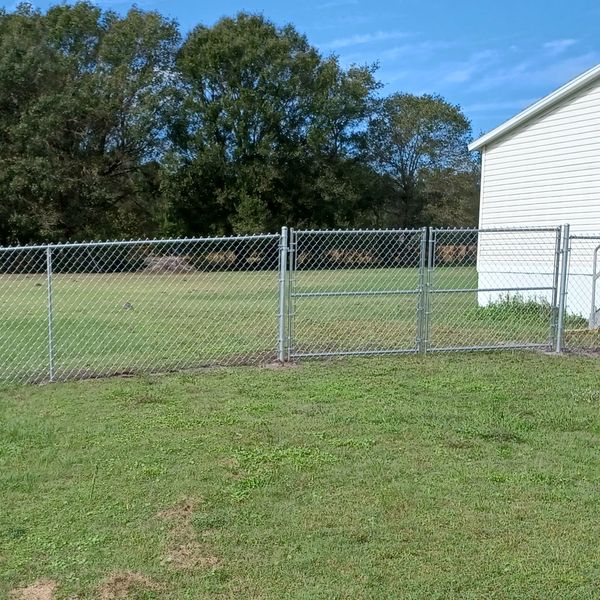 Galvanized 5' chain link fence and gate.