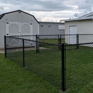 Black 4' chain link fence with double gate.