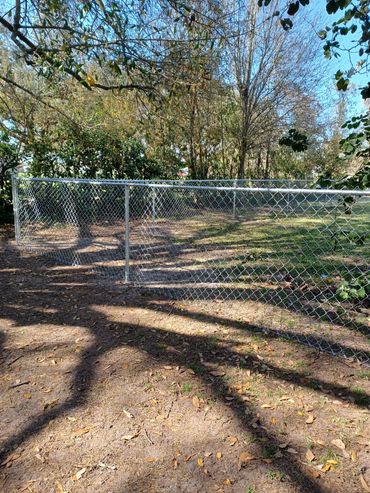 Galvanized 4' chain link fence.