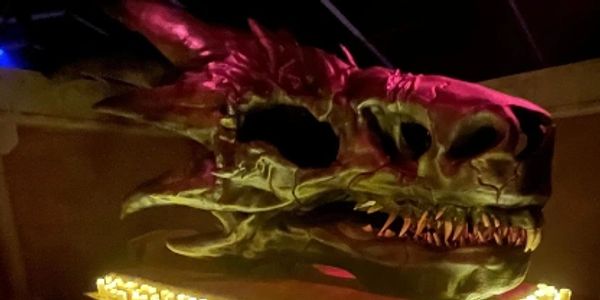 close-up of a giant dragon skull and egg from hbo's house of the dragon activation.