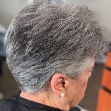 a short layered haircut on sale and peppered closed hair