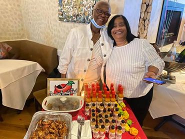 Grandma Shirley pictured with Shirley's Scarborough Spice and a customer.