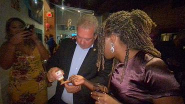 Yonkers Mayor, Mike Spano, pictured trying Shirley's Scarborough Spice.