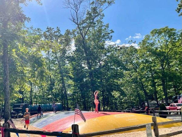 Campers enjoying the jumping pillow.