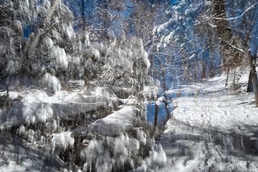 Exploring a snowy trail utilizing slow shutter, double exposure and intentional camera motion.