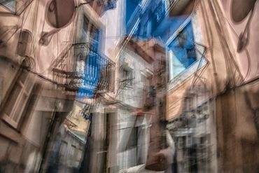 Impressions of Lisbon using slow shutter, and double exposure with intentional camera movement.