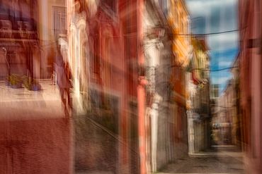Impressions of Lisbon using slow shutter, and double exposure with intentional camera movement.