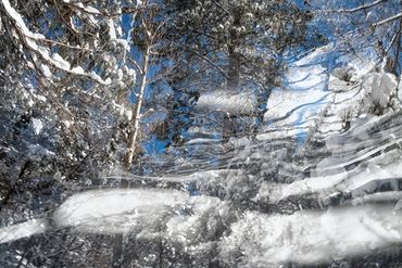 Exploring a snowy trail utilizing slow shutter, double exposure and intentional camera motion.