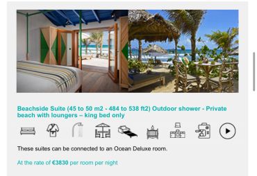 Beachside suite with king bed and private beach access.