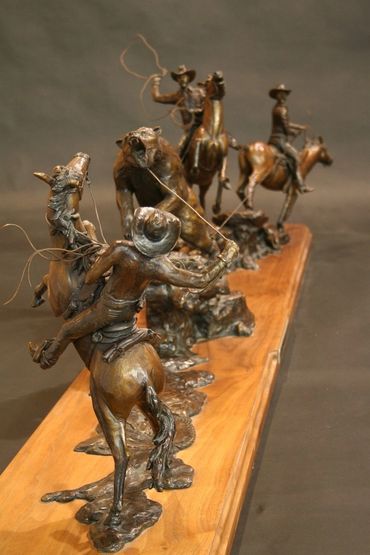 western bronze sculpture horses cowboys 