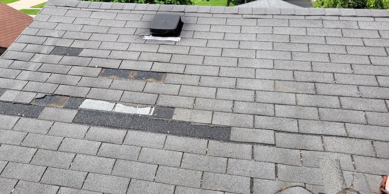 Wind Damage Roofing shingles