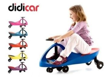 Girl on a toy Didi cars